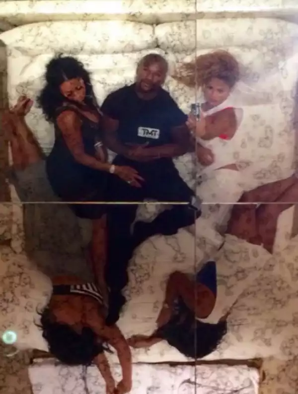 Floyd Mayweather Shares Photo With Four Women On Bed [See Photo]